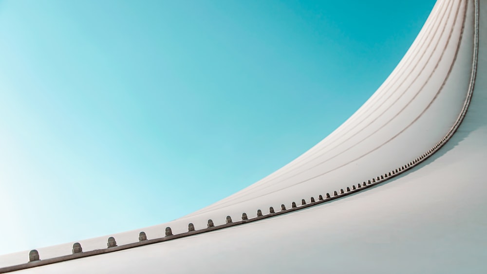 white concrete building under blue sky during daytime