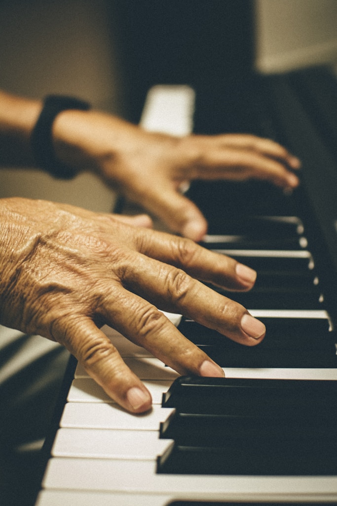 person playing black and white piano