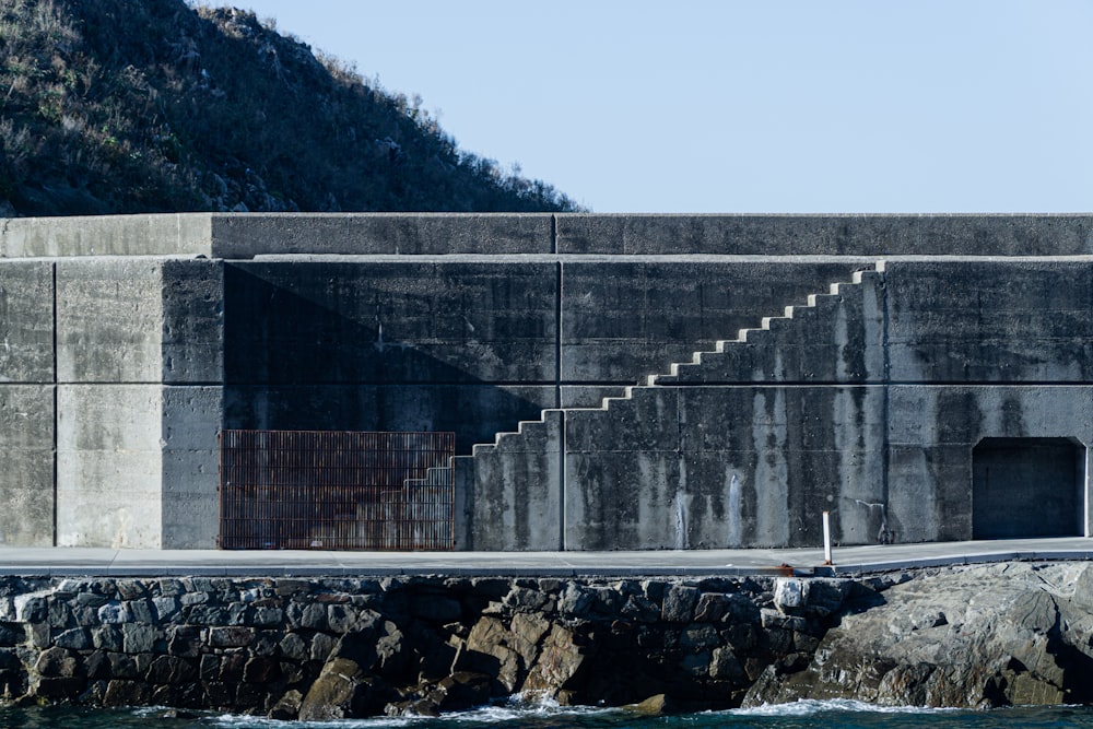 gray concrete bridge over river during daytime