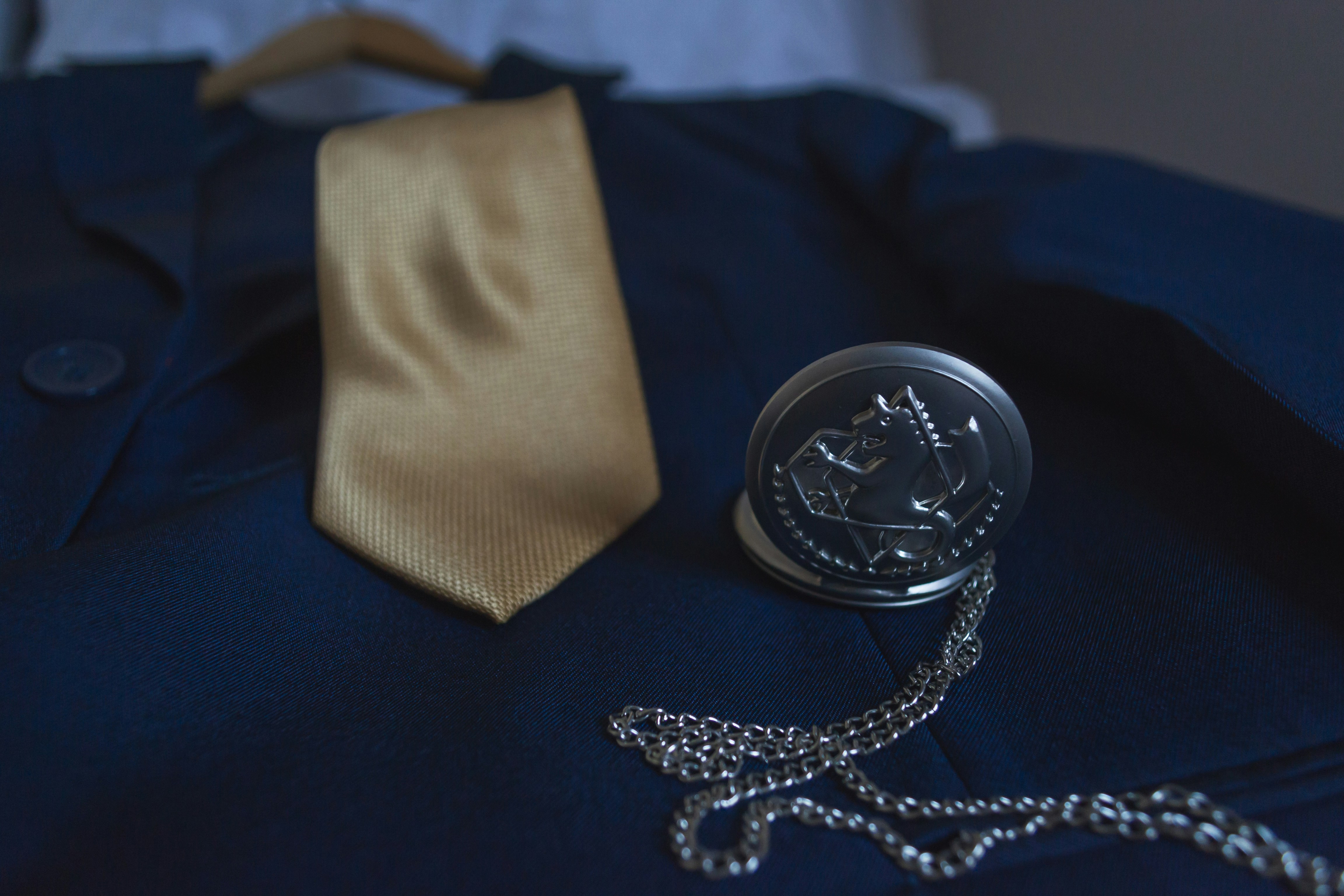 brown textile on black textile