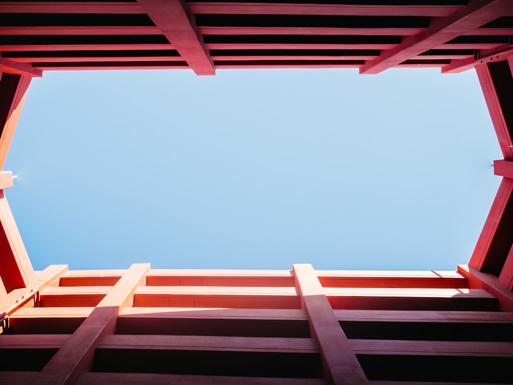 brown wooden fence under blue sky during daytime