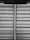 Horizontal blinds with a fabric texture are partially drawn, allowing a vertical sliver of light to pass through. A pull cord hangs from the upper portion of the blinds.