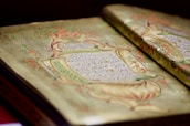 An open book with artistic sketches and notes, symbolizing the exploration of culture and creativity.