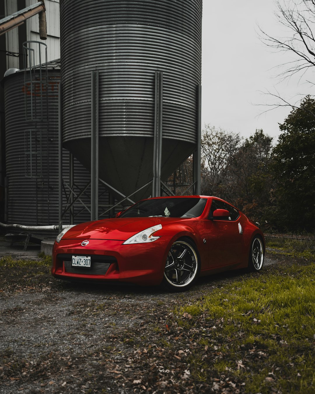 red ferrari 458 italia parked near building