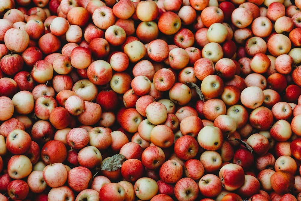 red round fruits on brown wooden table