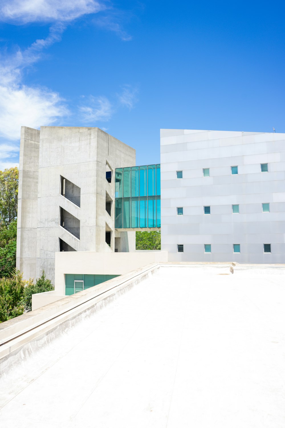 white concrete building under blue sky during daytime