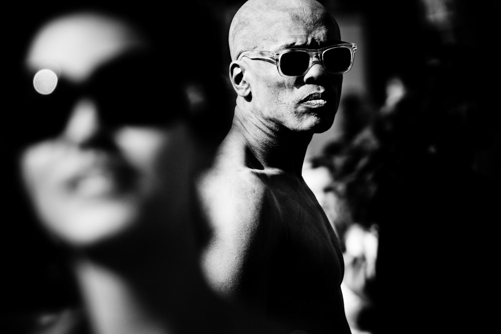 grayscale photo of man wearing sunglasses