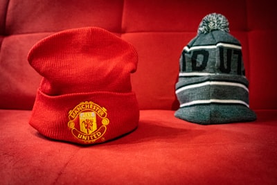 gray and black knit cap manchester united teams background