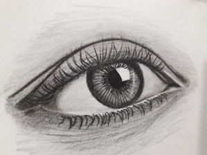 persons eye in grayscale