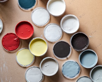 white red blue and yellow ceramic bowls