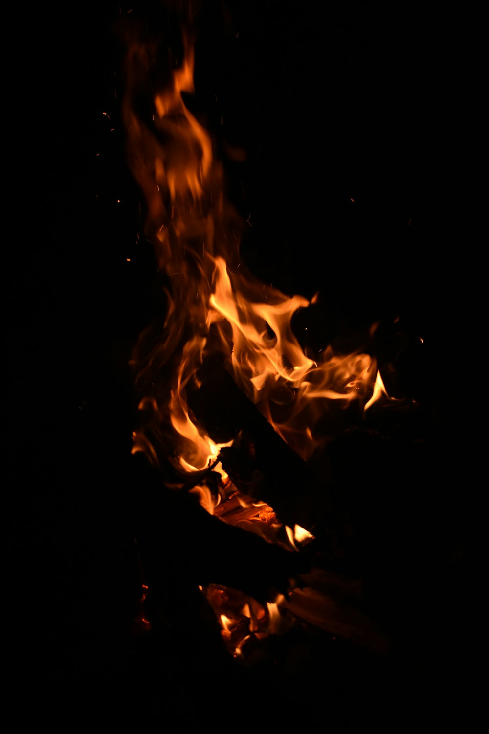 fire in black background with black background