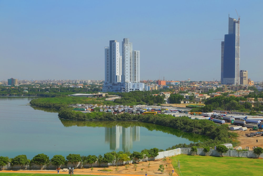 city buildings near body of water during daytime