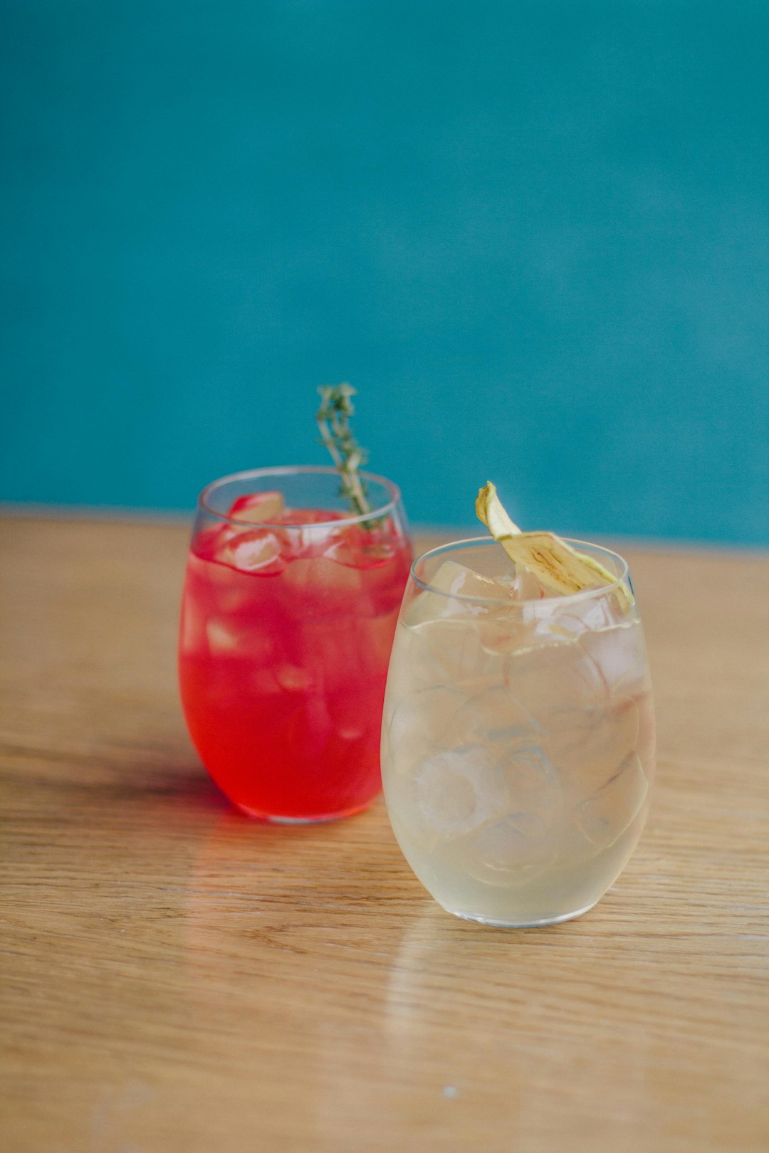 clear drinking glass with red liquid