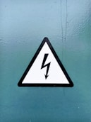 black and white arrow sign