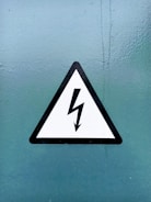 black and white arrow sign