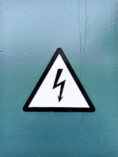 black and white arrow sign