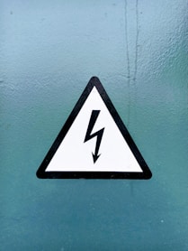 black and white arrow sign