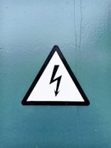 black and white arrow sign