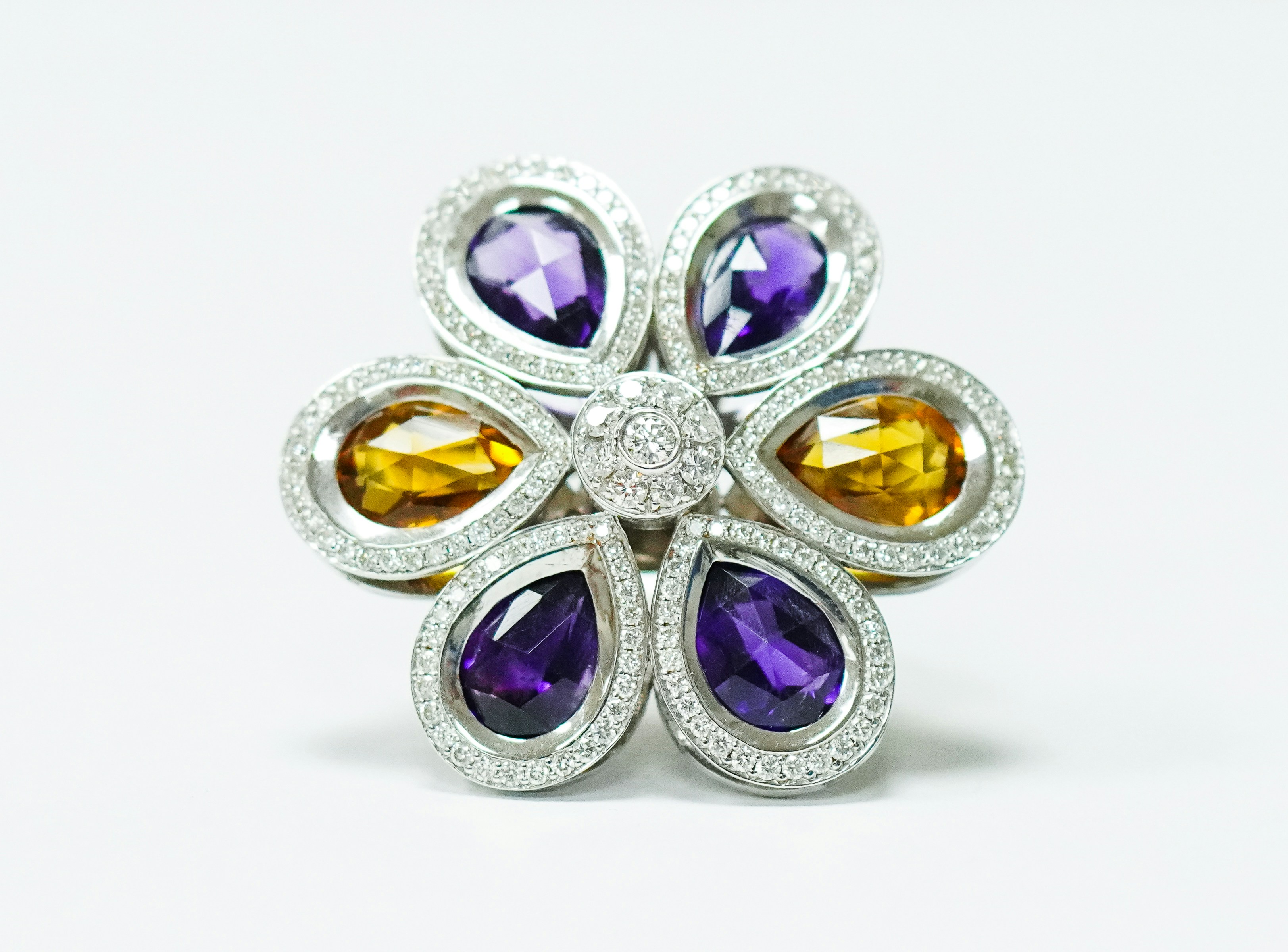 great photo recipe,how to photograph this beautiful ring was designed and handmade in antwerp by j.katz. you can find more info at j.katz.be; silver and purple star accessory