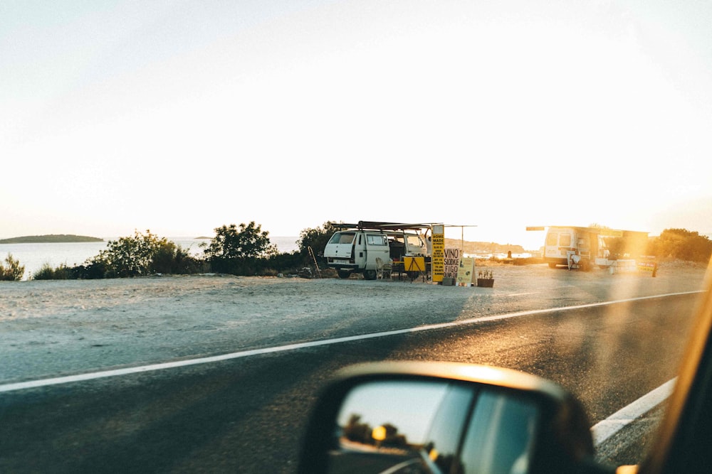 black car on road during daytime