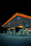 white and red store front during night time