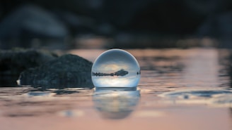 A serene image of a crystal ball reflecting light.