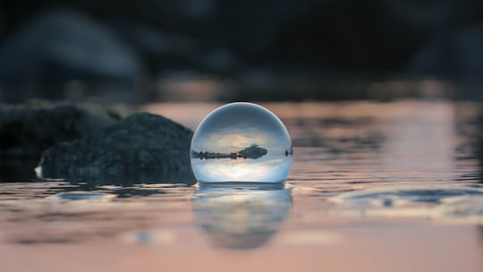 A serene image of a crystal ball reflecting light.
