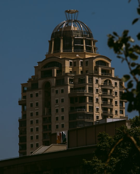 white concrete building during daytime in Sandton South Africa