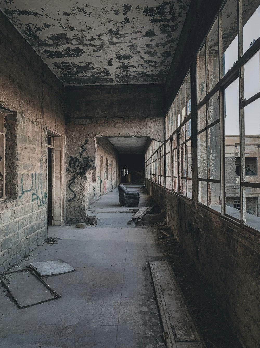 empty hallway with brown brick walls