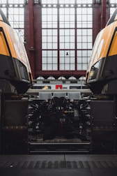 black and white truck in front of white and red building