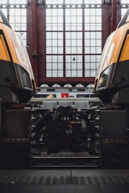 black and white truck in front of white and red building