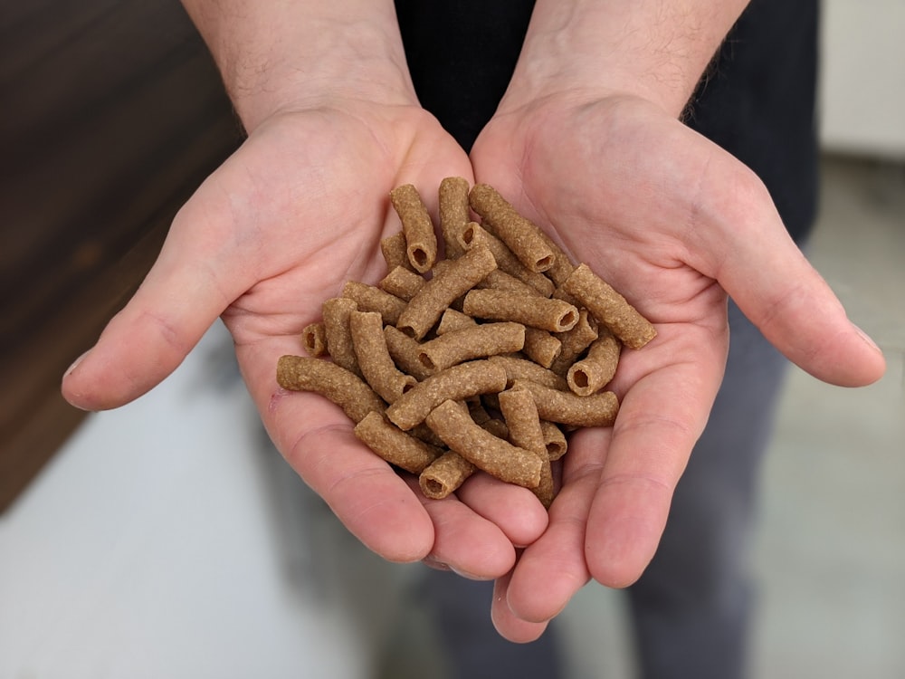 brown hair band on persons hand