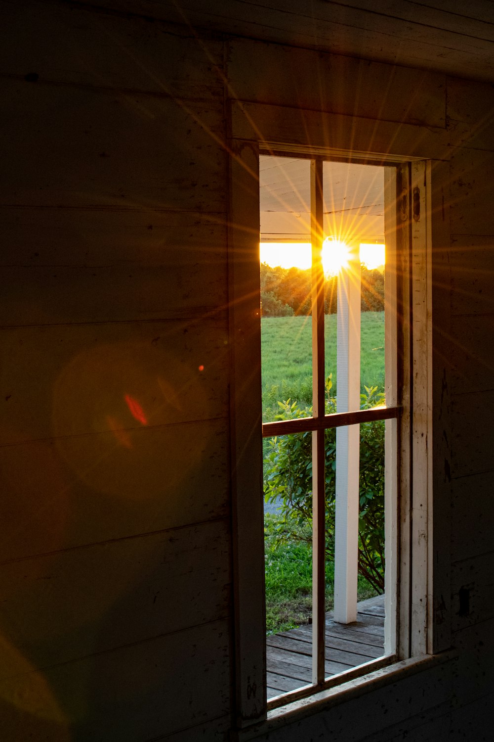 white wooden framed glass window