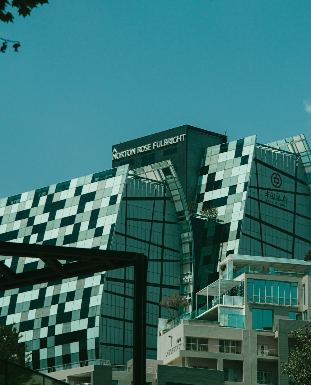 green concrete building under blue sky during daytime