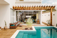 Before and after side-by-side comparison showing a complete pool and patio makeover.