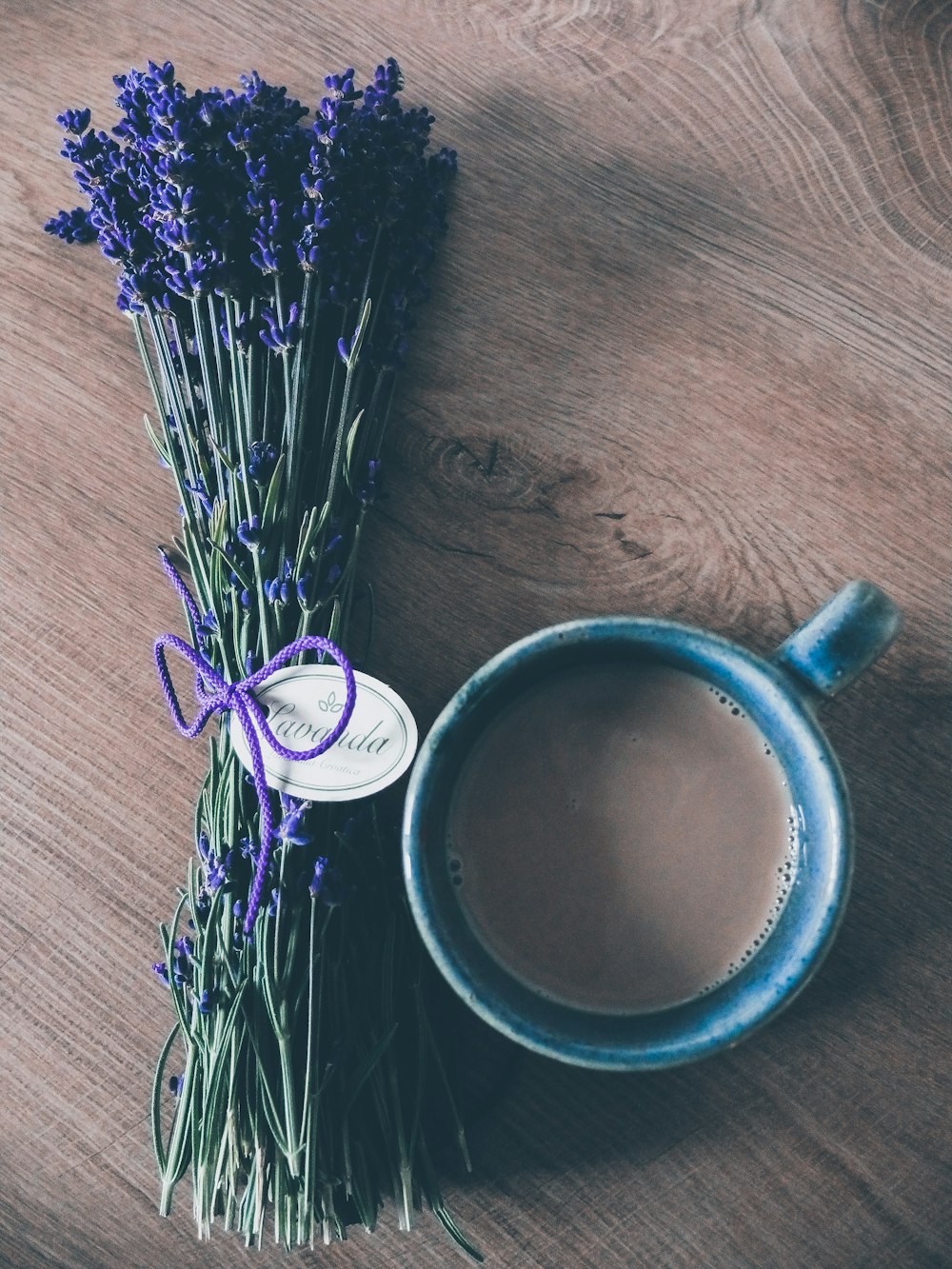 blue ceramic mug with coffee