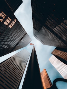 worms eye view of high rise buildings during daytime