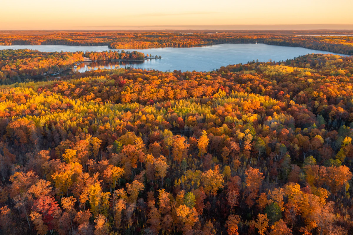 Autumn forest around a lake near Lac du Flambeau, Wisconsin, seen from above
