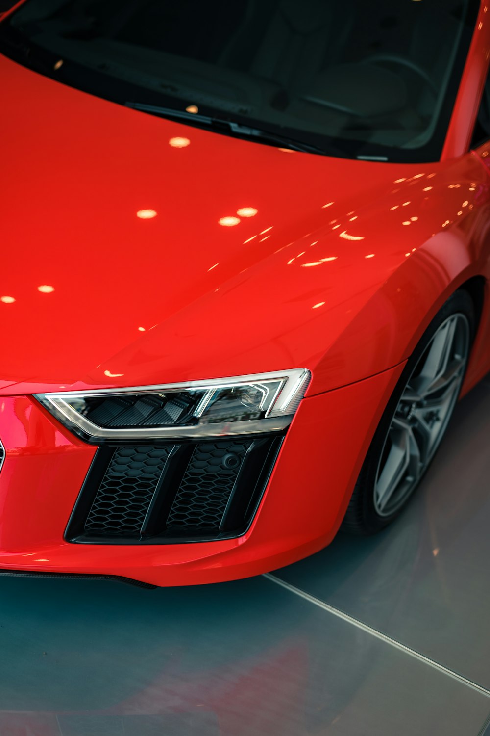 red audi car in close up photography