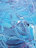 A vibrant blue abstract painting representing security.
