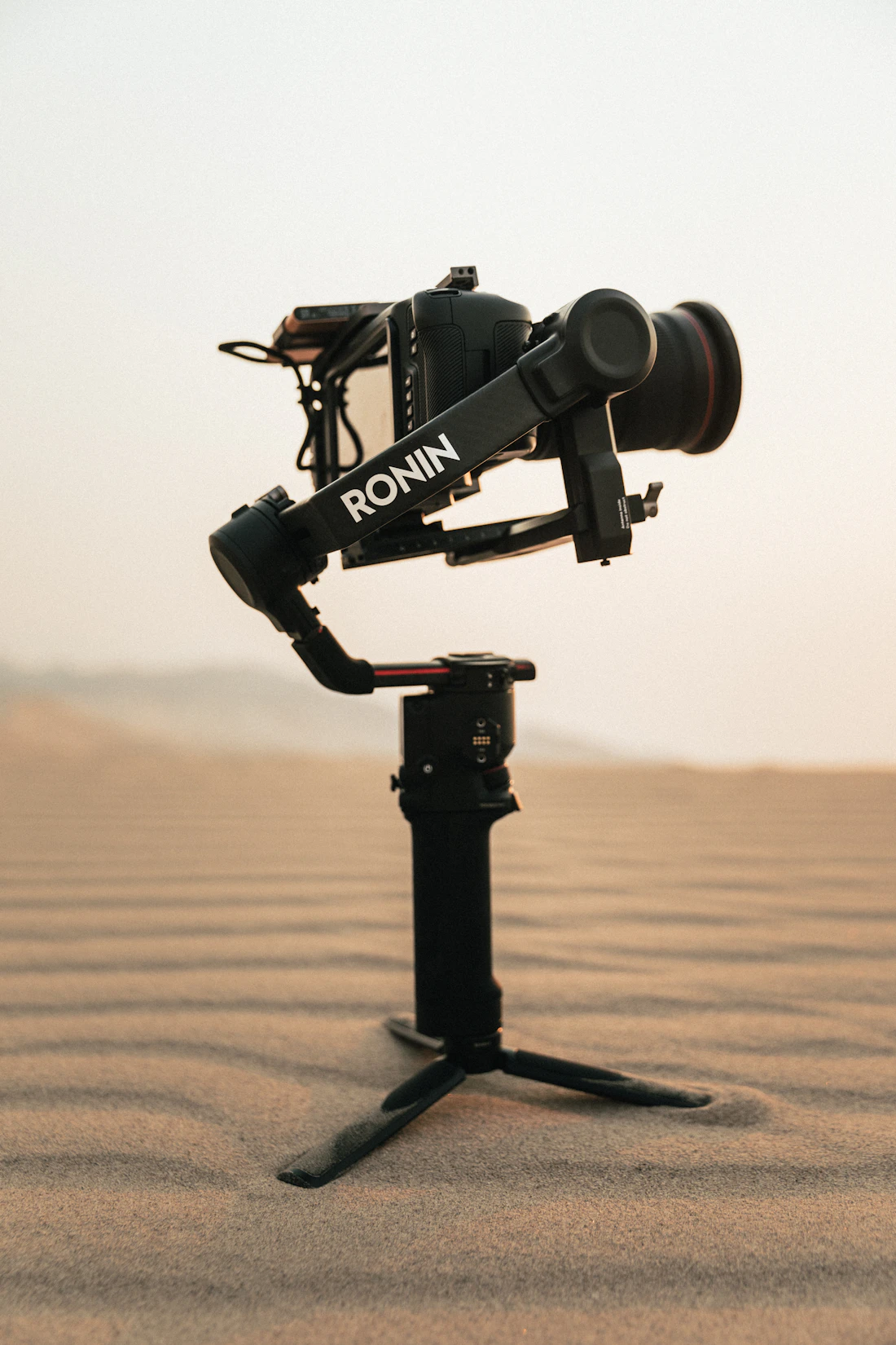 Camera on a tripod on the beach