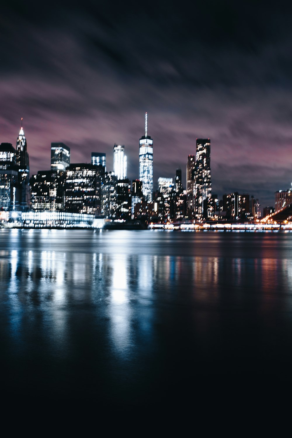 city skyline during night time