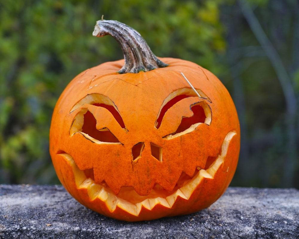 jack o lantern on gray concrete floor