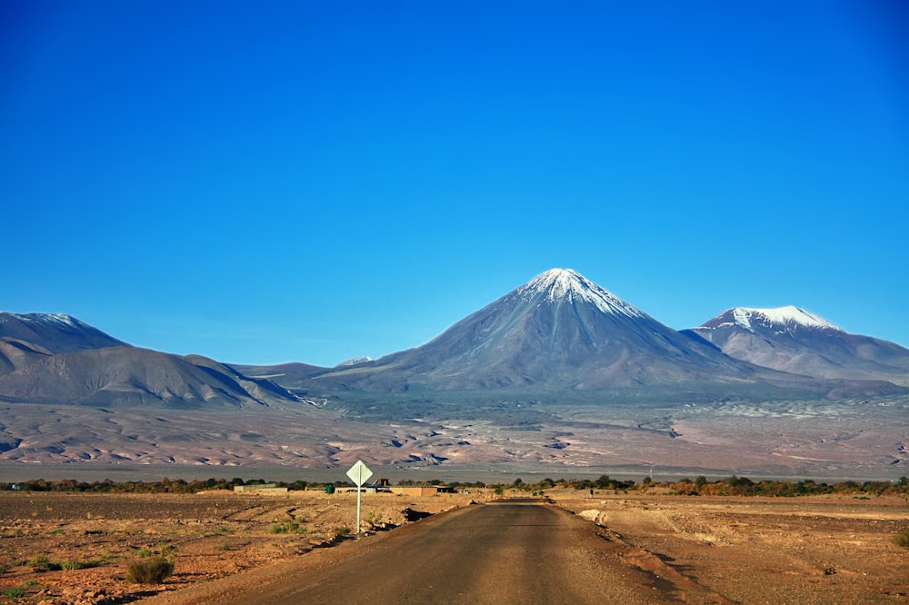 brown and white mountain under blue sky during daytime