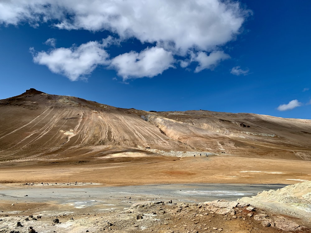 brown mountain under blue sky during daytime