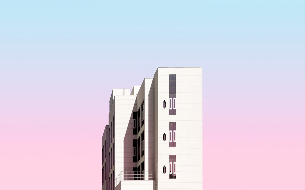 white and pink concrete building