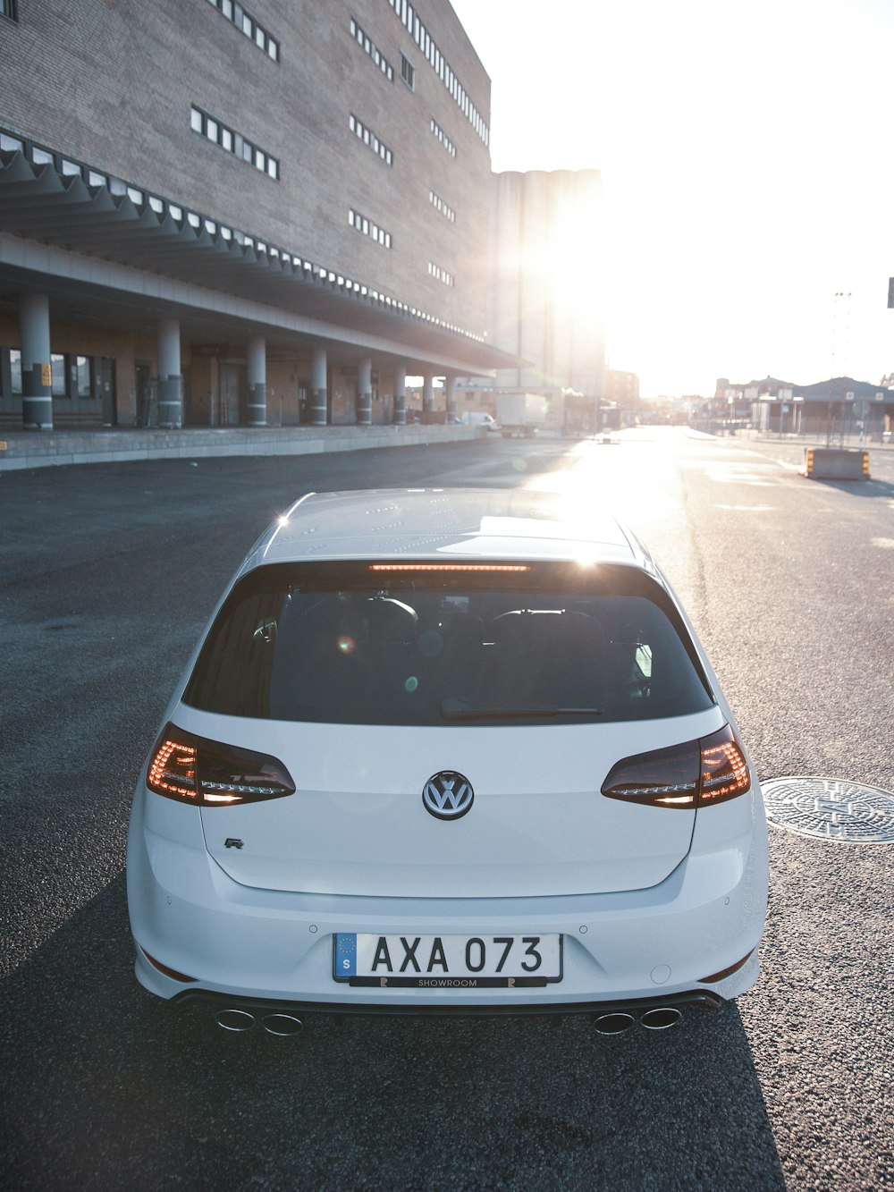 silver volkswagen car on road during daytime