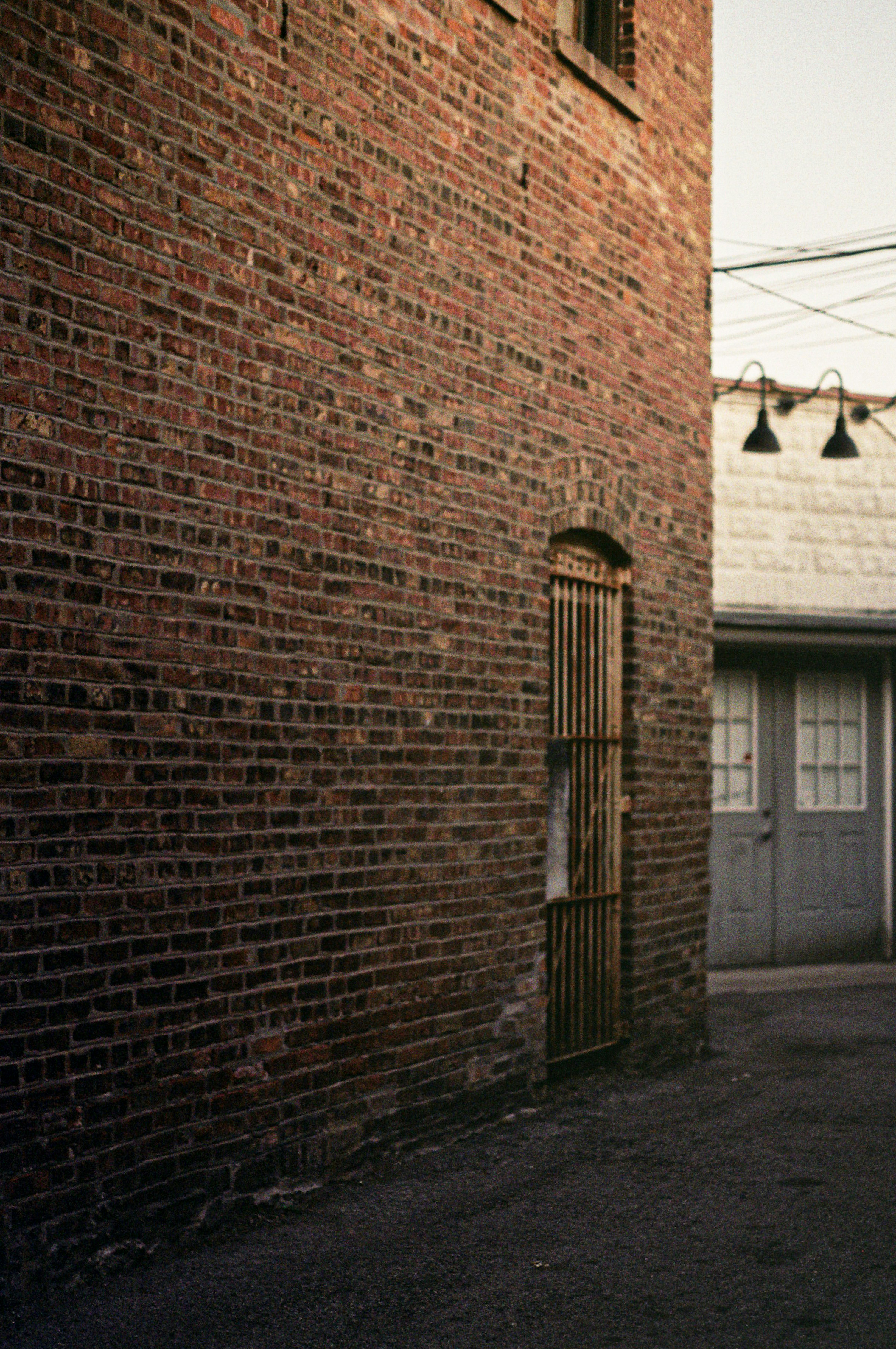 Brown Brick Wall With Sconce Lamp Photo Free Lagrange Park Image On Unsplash