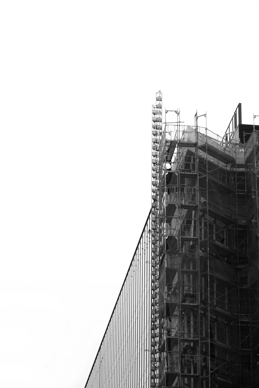 grayscale photo of high rise building