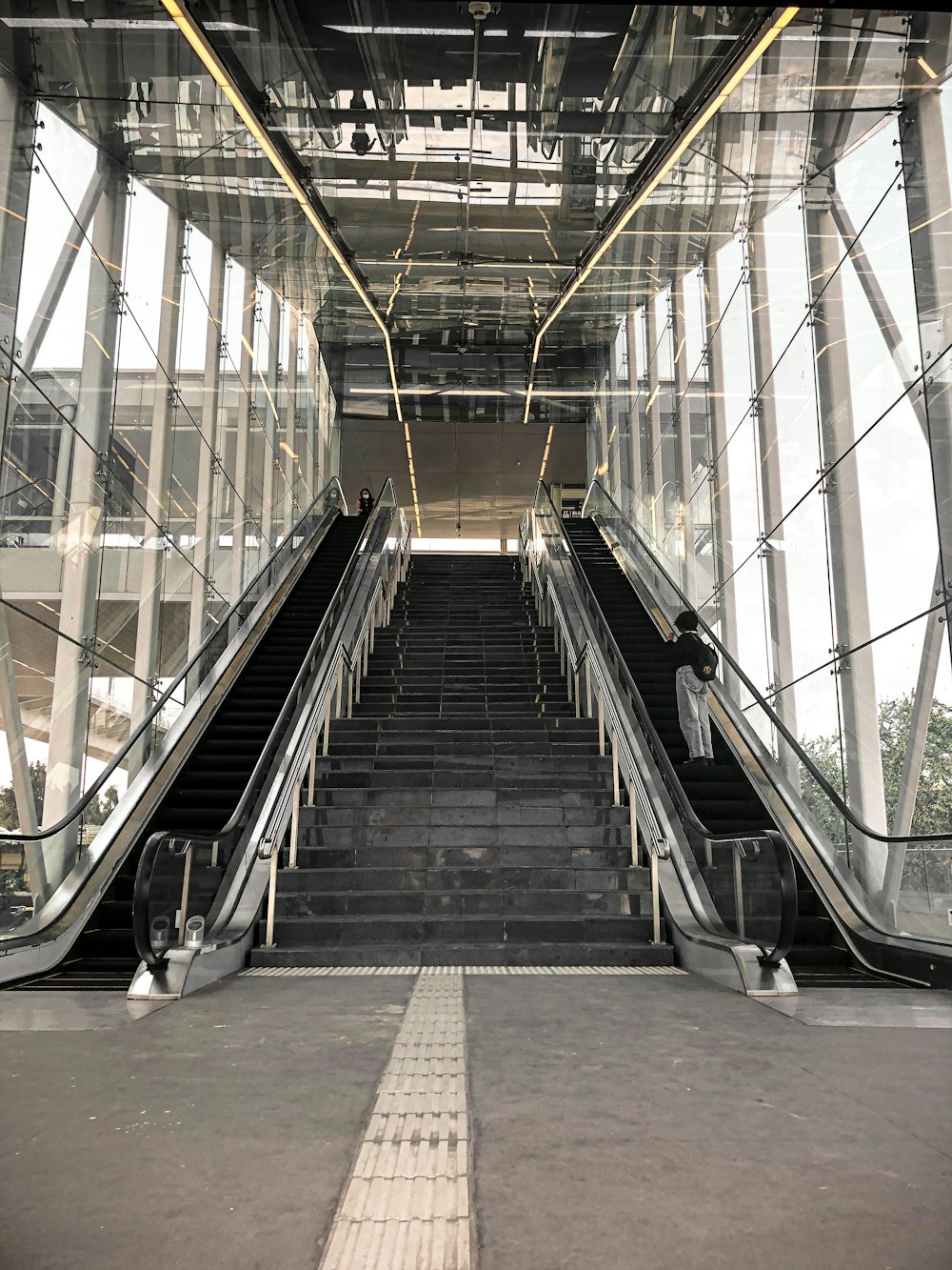 stainless steel and black escalator